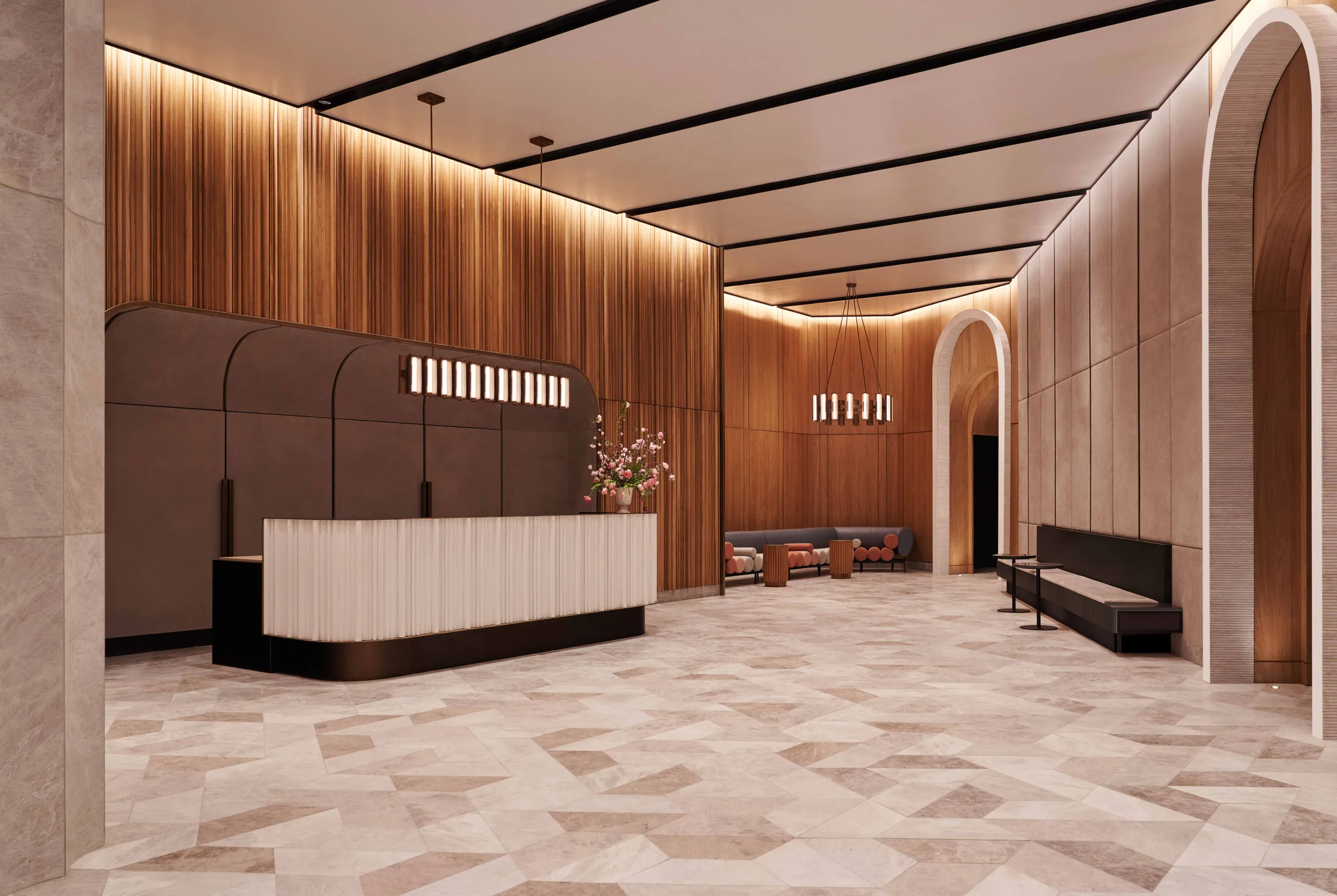 CGI render of a lobby with a fluted reception desk, wood-panelled walls, arched doorways and marble floor, for The Brooklyn Tower.